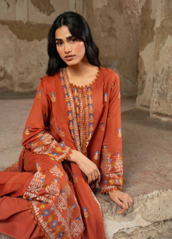 A warm terracotta 3-piece unstitched suit