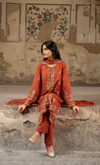 A warm terracotta 3-piece unstitched suit