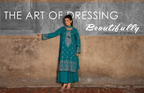 A rich teal 3-piece unstitched suit featuring intricate traditional embroidery