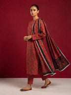 A red patterned 3-Piece Printed Unstitched Suit featuring delicate floral motifs in red patterned